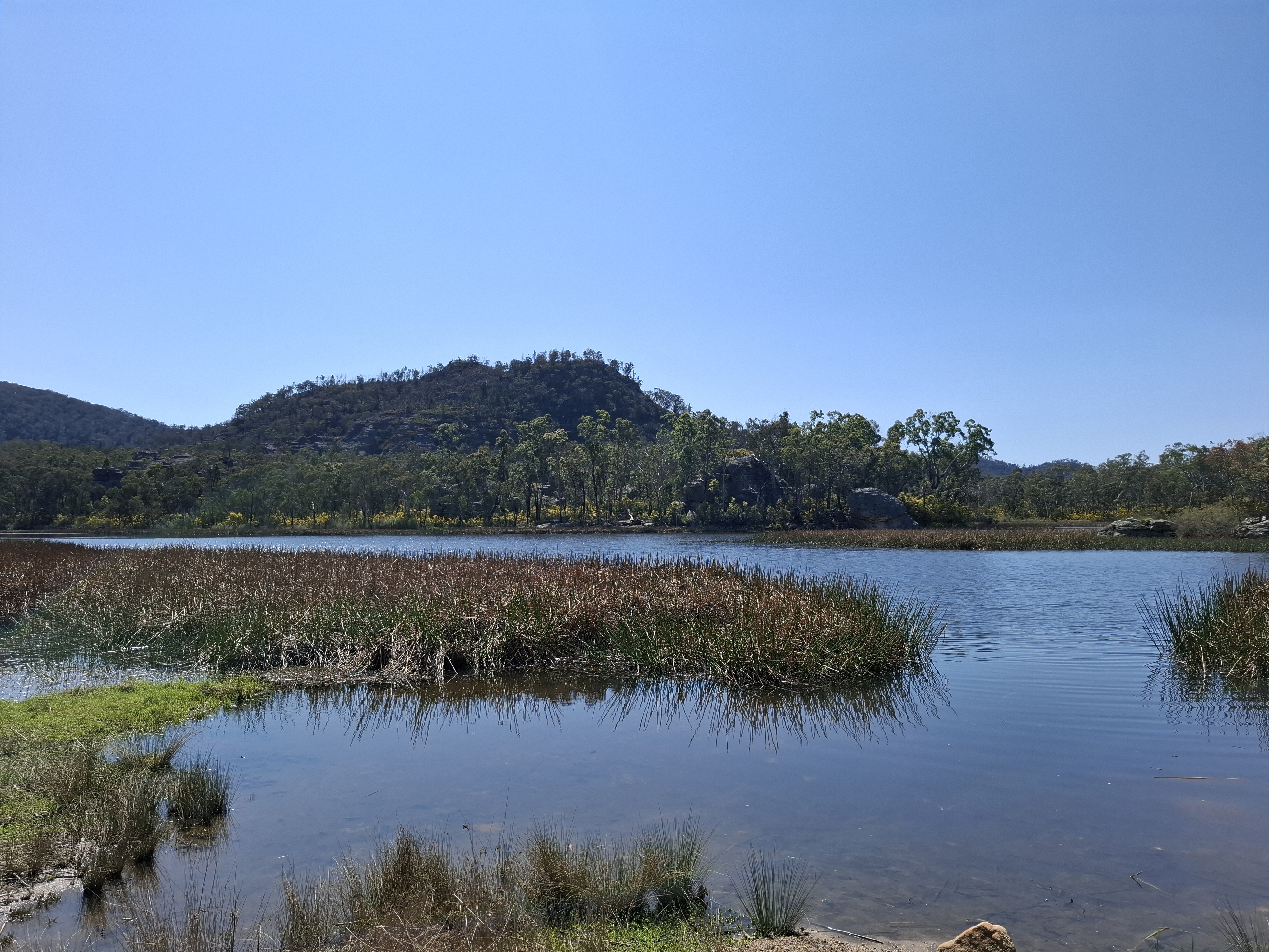 Part of the river that feeds to a damn